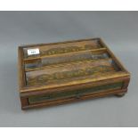 19th century brass inlaid desk inkstand with three pen trays and long drawer to the base, on bun