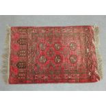 Tekke Bokhara prayer rug with a red field 110 x 70cm