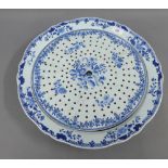 Chinese blue and white floral patterned bowl, with circular pierced draining plaque, size overall