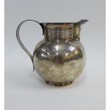 Edwardian silver jug with a reeded strap handle and matching collar, Marston & Bayliss, Birmingham