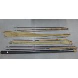 A large collection of fishing rods and flies to include Salmon rods; Hardie Carbon Fibre 15'4",