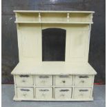 Small painted wooden cabinet with eight drawers and pressed metal labels, 50cm high