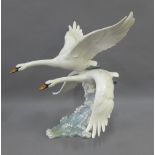 Hutschenreuther porcelain Swans in Flight figure, modelled by Achtziger, with impressed and