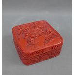 Chinese cinnabar lacquered box and cover, carved with a floral pattern, 13 .5 x 13.5cm