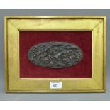 Bronze patinated oval plaque on a velvet background within a giltwood frame, size overall 32 x 24cm