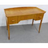 Vintage light oak / beech side table with a curved ledgeback above two short drawers with peg shaped