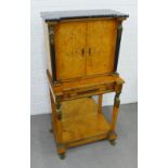 Biedermeier style burrwood and gilt metal mounted secretaire cabinet with an inverted black marble