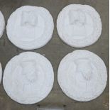 Set of four white plaster 'Stirling Heads' roundel 78cm diameter (4)