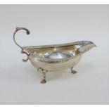 George III silver sauce boat, with gadrooned edge and hoof feet, John Eames, London 1807, 13cm long