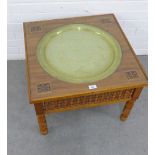 Modern side table with Indian style brass charger and glass top, 62 x 45cm