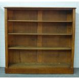 Mahogany open bookcase, with adjustable shelves and on a plinth base, 130 x 122 x 27cm