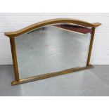 Giltwood overmantle with an arched mirror plate, 121 x 77cm