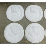 Set of four white plaster 'Stirling Heads' roundel 78cm diameter (4)
