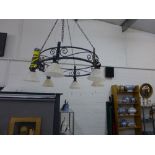 Circular iron ceiling light with six rose patterned glass shades
