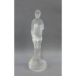 Early 20th century opaque glass car mascot figurine, on a circular base, 19cm high