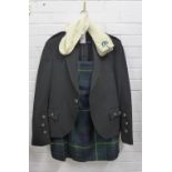 Gents kilt outfit comprising an Argyle jacket with horn buttons, kilt and pair of woollen socks,