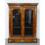 Victorian burr walnut and gilt metal mounted cabinet with glazed panels and doors, blue velvet