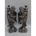 Pair of carved rootwood chinoiserie figures, 39cm (2)