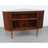 Rosewood veneered corner drinks cabinet, with central rotating section and glazed interior, 113 x