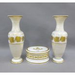 Pair of 19th century white glass vases with gilt fruit and vine pattern and borders, together with a