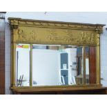 A gilt framed overmantle mirror with chariot and classical figures to the frieze over a triple