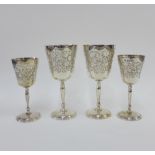 Four silver goblets, Birmingham 1969 /70, with foliate bright cut engraved pattern, tallest 14cm (