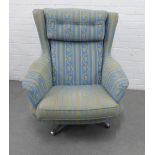 Vintage retro swivel chair with pale blue upholstery and chromed metal base, 96 x 80cm