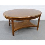 John Lewis hardwood coffee table with an oval top and Bergere undertier, 50 x 106 x 78cm
