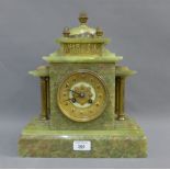 Late 19th / early 20th century green hardstone mantle clock, with a French brass movement striking