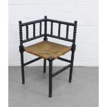 Arts & Crafts ebonised bobbin corner chair with woven seat, 68 x 56cm