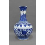 Chinese blue and white vase with floral pattern and lappet borders, on a circular footrim, bearing a
