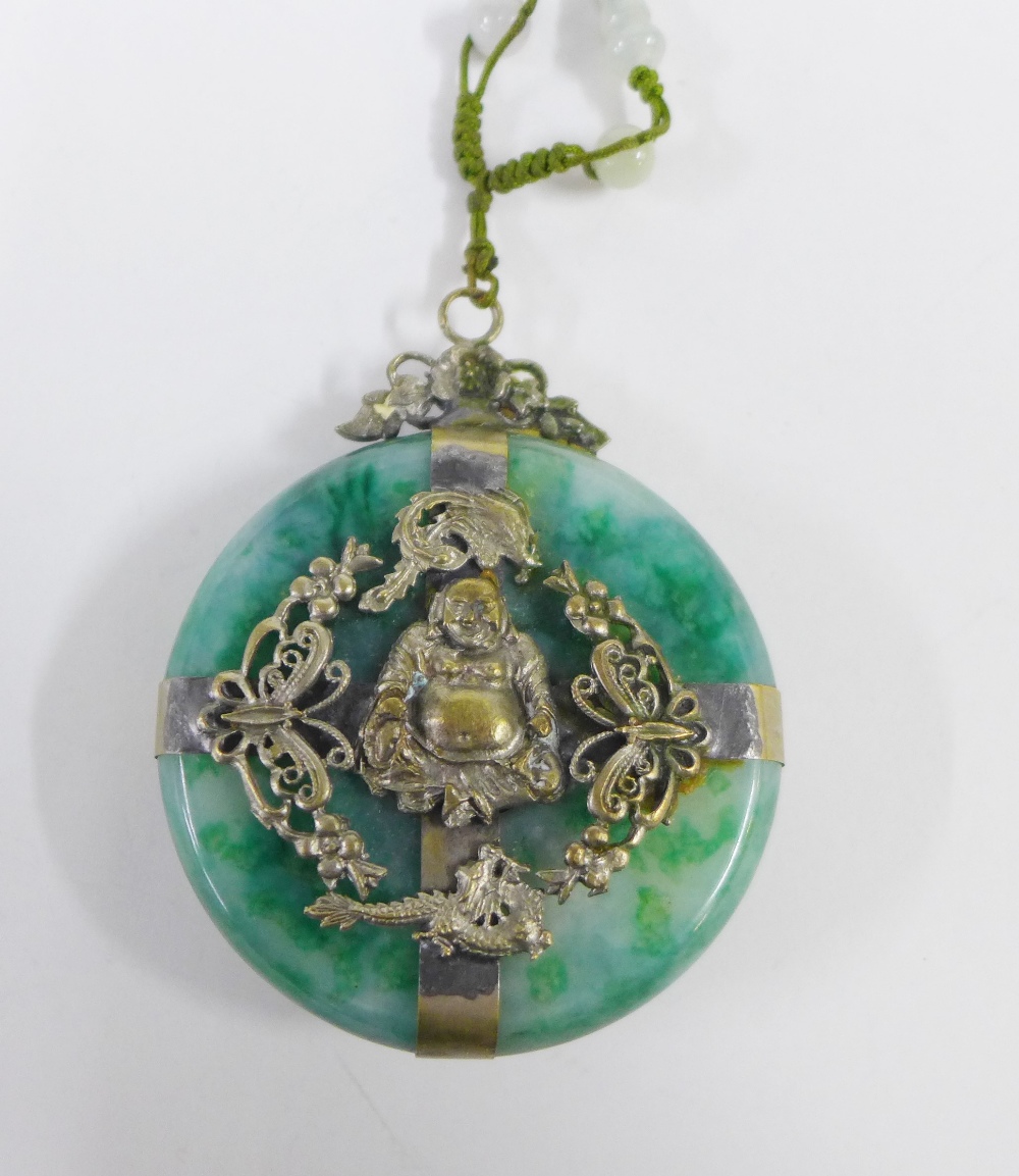 Early 20th century jadeite Buddhist pendant of disc form with filigree mounts, 6cm - Image 2 of 3