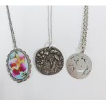 Plique a jour enamel pendant in a silver frame, Sterling silver South Africa pendant and another,