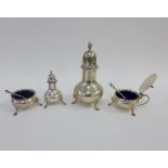 Four-piece silver cruet set by Harrods, Ltd, London 1965 / 66, comprising sugar castor, pepper