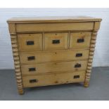 Pine Scotch chest with a single long drawer over three short and two long, with Art Nouveau style