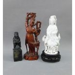Blanc de chine Guanyin, soapstone Sage and a carved fruitwood female figure, tallest 17cm (3)