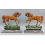 A pair of painted metal Horse doorstop, 28 x 28cm (2)