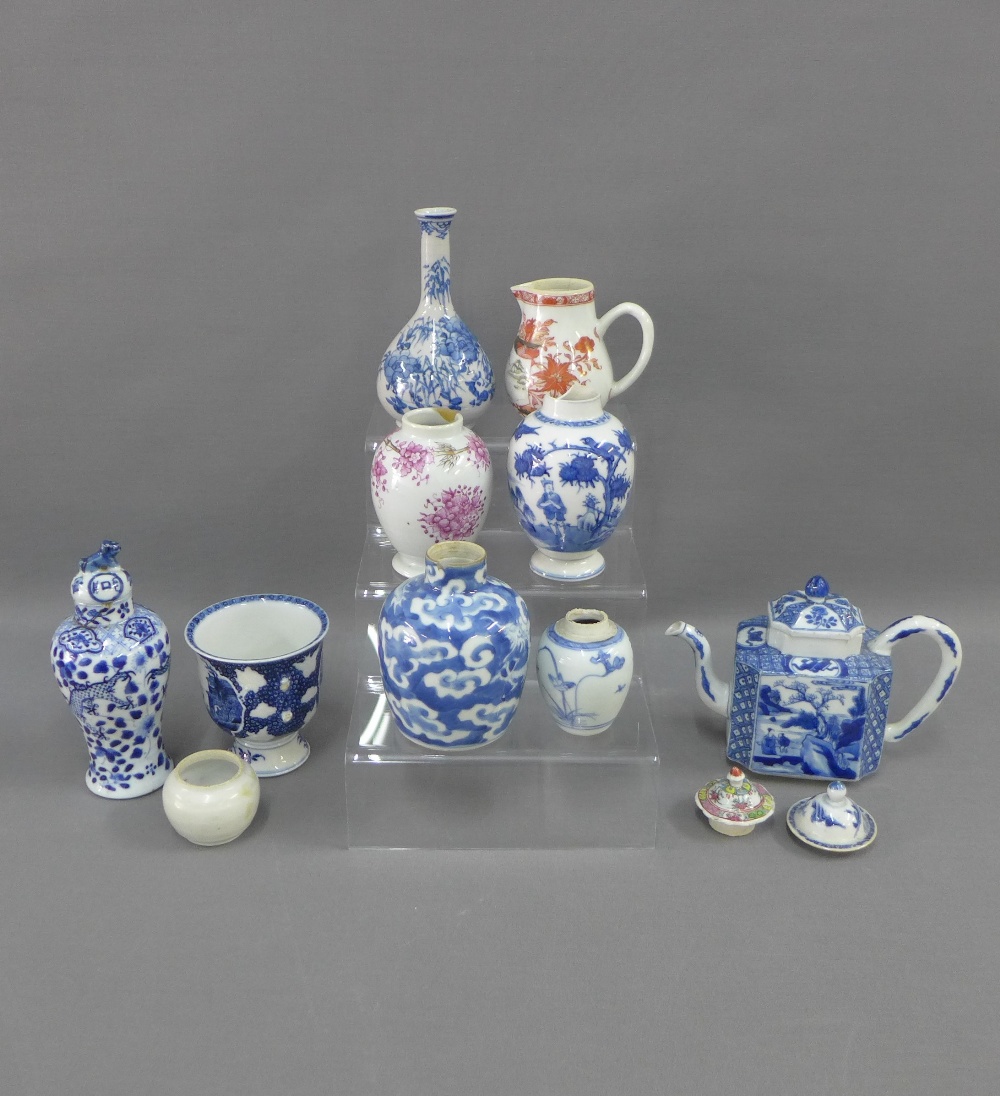 Collection of Chinese 19th century and later porcelains to include a teapot, vases, sparrow beak