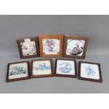 Collection of seven framed Delft tiles, to include three blue and white, overall size including