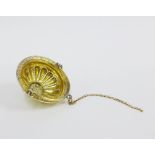 19th century Russian silver gilt tea strainer in the form of a basket with floral engraved border,