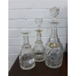 Three decanter, two stoper and a silver 'Sherry' decanter label, (a lot)