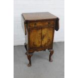 Early 20th century walnut cabinet, with drop flaps and pair of cupboard doors, on short cabriole