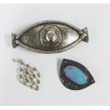 Arts & Crafts pewter brooch with Ruskin style coloured cabochon, Scooter of Paris hair clip and a