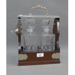Modern Tantalus with two cut glass spirit decanters with stoppers