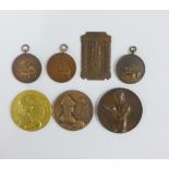 Early 20th century bronze medallions to include Rifle Shooting, Swimming and Boxing, etc (5)