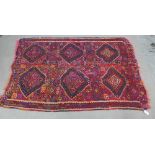 Kelim rug with brightly coloured geometric pattern, 210 x 144cm (a/f)