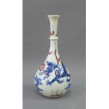 Chinese bottle neck vase with blue and white dragon pattern with iron red clouds, blue leaf