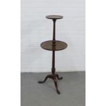 Mahogany two tier dumb waiter on a tripod base, 114 x 42cm