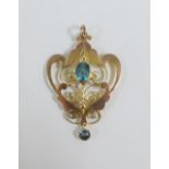 Edwardian 9ct gold and aquamarine pendant of Art Nouveau design, 4cm
