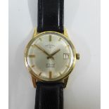 Gent's vintage gold plated rotary wrist watch on a black leather strap